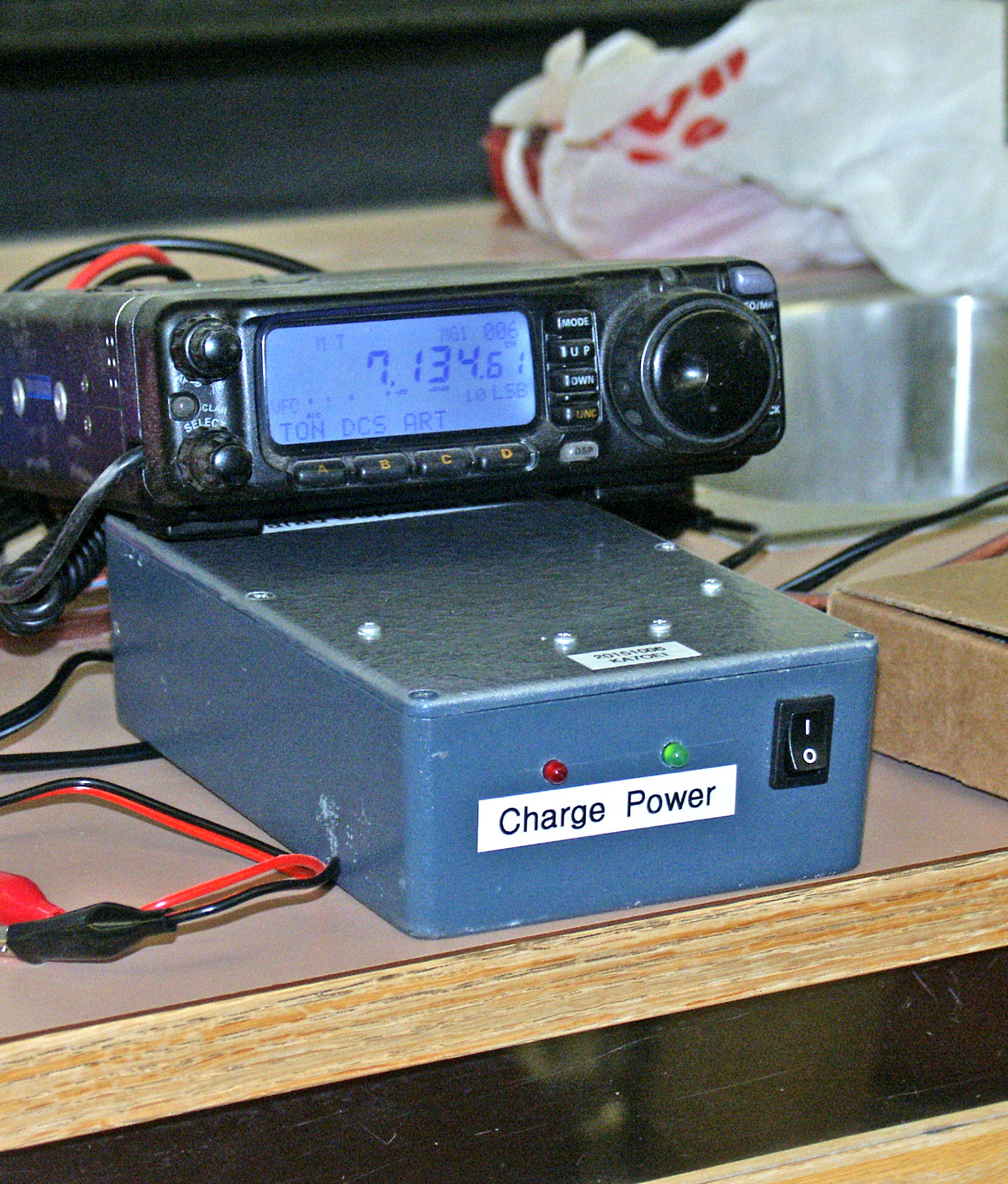 Metal box with
power switch, pilot lights, and “Charge Power” label